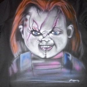 A black crew neck sweater with elusive airbrush